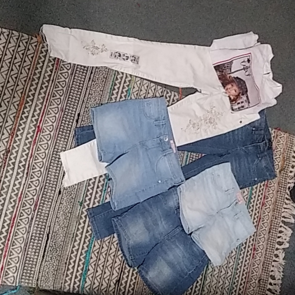 A bundle of shorts, Jeans and a Shirt